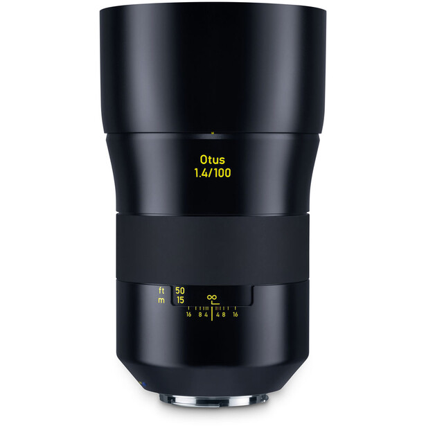 Zeiss Otus 1.4/100 telephoto lens with focus ring and aperture markings visible against white background.