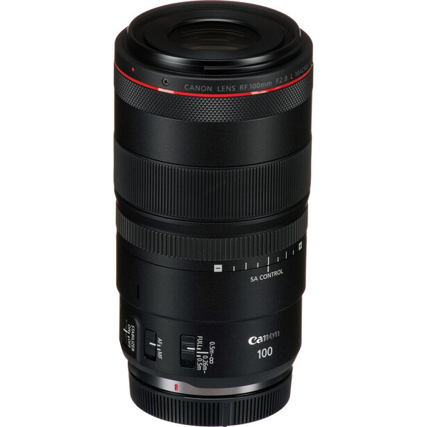 Canon RF 100mm f/2.8L Macro lens with black barrel and red accents on white background.