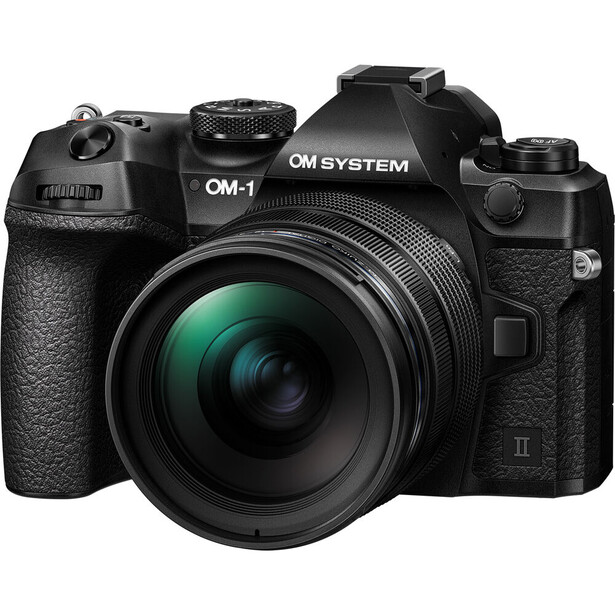 OM System OM-1 Mark II mirrorless camera with attached lens, front three-quarter view.