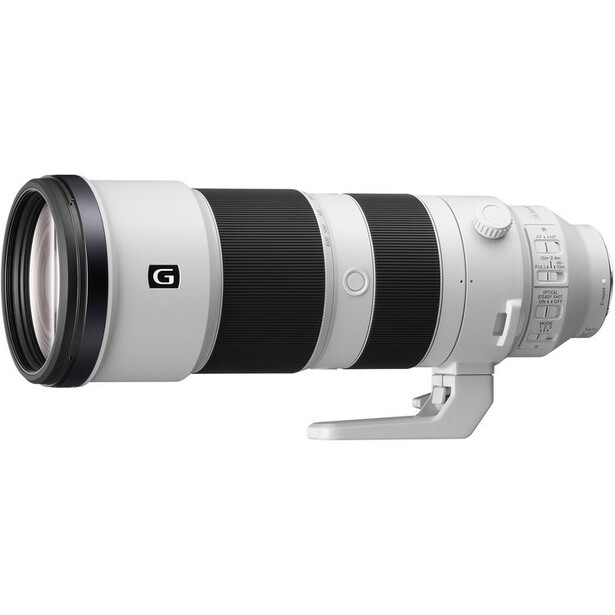 Sony G-series telephoto lens with white and black barrel, front element visible.