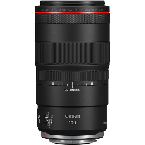 Canon RF 100mm f/2.8L Macro lens with focus ring and distance scale visible against white background.