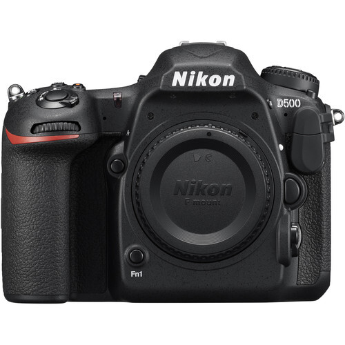 Nikon D500 DSLR camera body shown from front, displaying the lens mount and control interface.