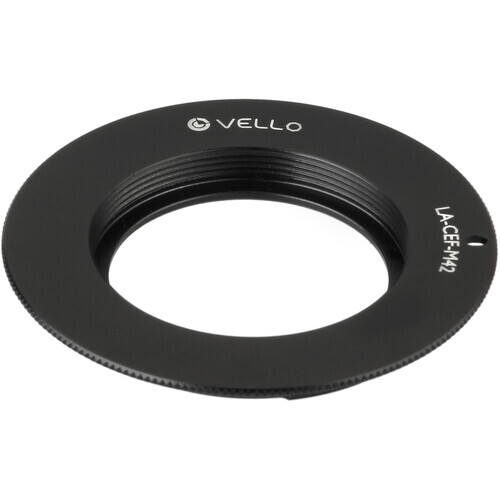 Vello lens mount adapter ring with M42 thread on black background.