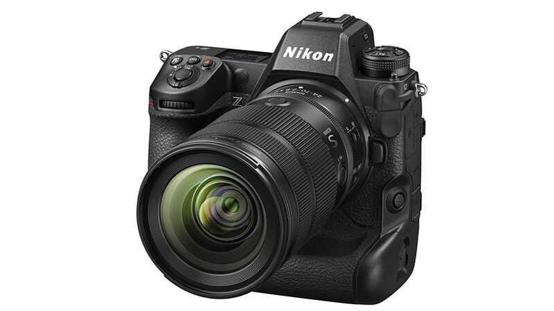 Nikon Z9 mirrorless camera with attached zoom lens and battery grip, viewed from front-left angle.