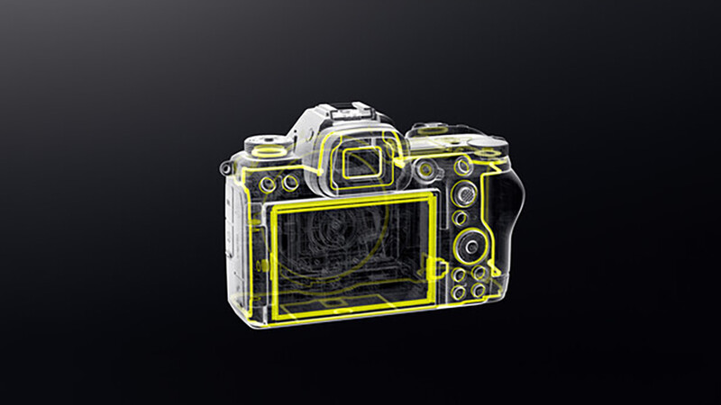 Illustration of a mirrorless camera with yellow and white neon outline effect against dark background.