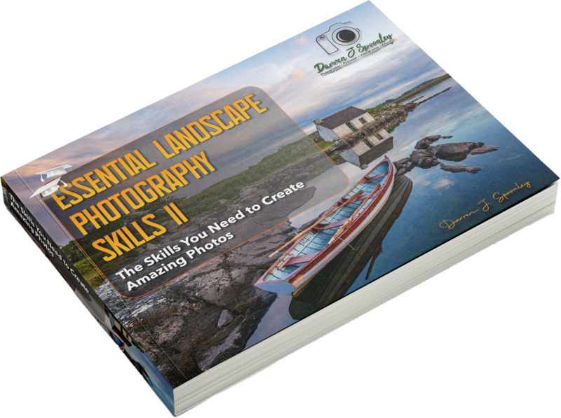 Book cover for Essential Landscape Photography Skills II featuring coastal boat photography.
