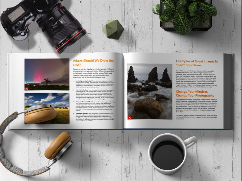 Flat lay of photography workspace featuring open magazine spread with landscape images, camera equipment, headphones, coffee mug, and potted plant on white wooden surface.
