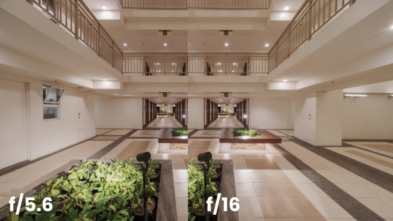 Symmetrical corridor with dual vanishing points, planters, and f-stop aperture values labeled on the floor.