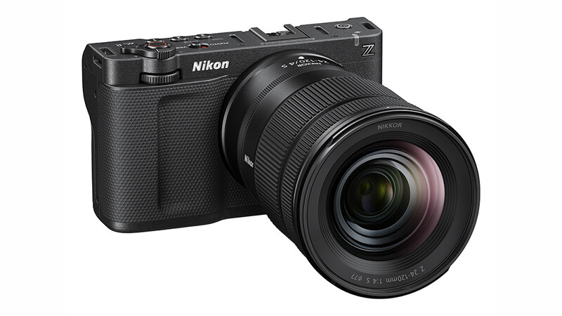Nikon Z mirrorless camera with attached zoom lens on white background.