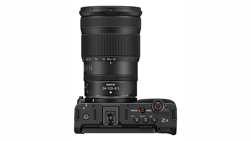 Nikon Z mirrorless camera with 24-120mm f/4.5 lens mounted, viewed from above.