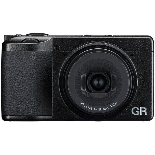 Ricoh GR compact digital camera with black textured body and fixed 28mm lens, shown from front-right angle.