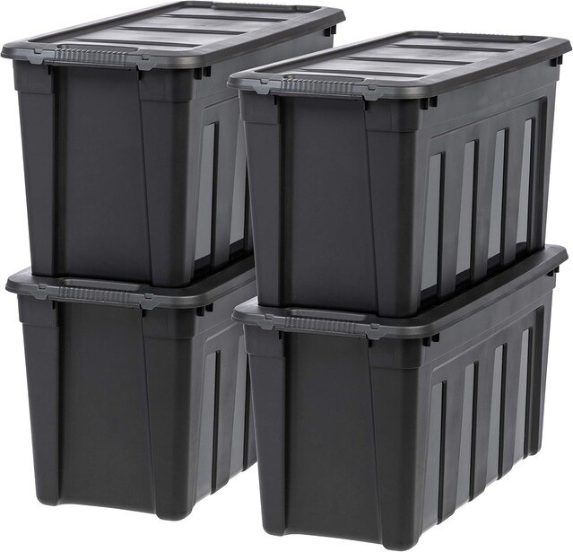 Four black plastic storage containers with lids stacked in a 2x2 arrangement.