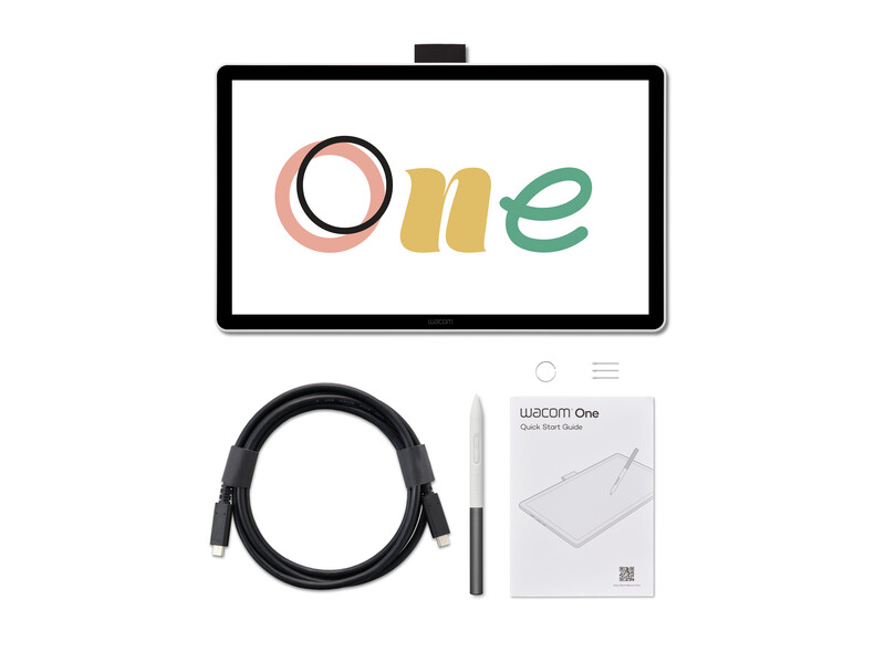 Wacom One pen display tablet with stylus and USB cable laid out flat.