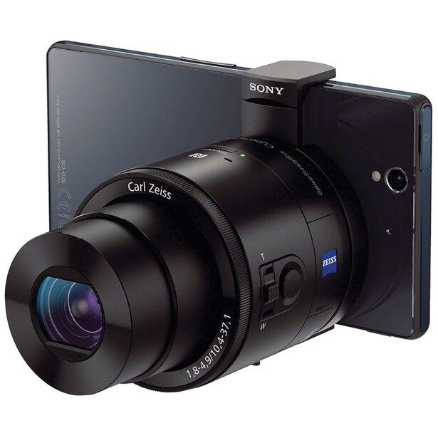 Sony mirrorless camera with Carl Zeiss lens mounted and smartphone attachment bracket.