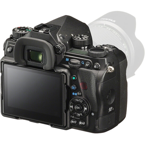 Mirrorless camera with articulating rear LCD screen and control dial visible from rear three-quarter view.