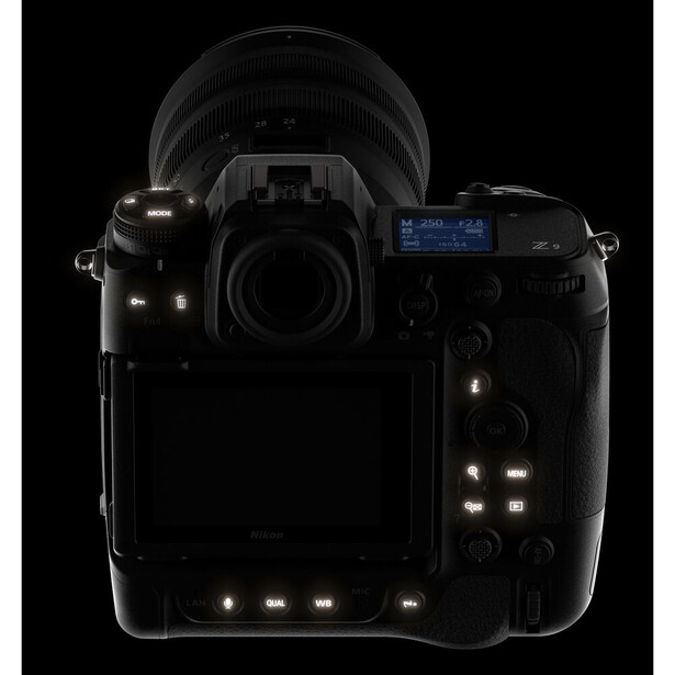 Professional DSLR camera body shown from above against black background with backlighting highlighting contours.
