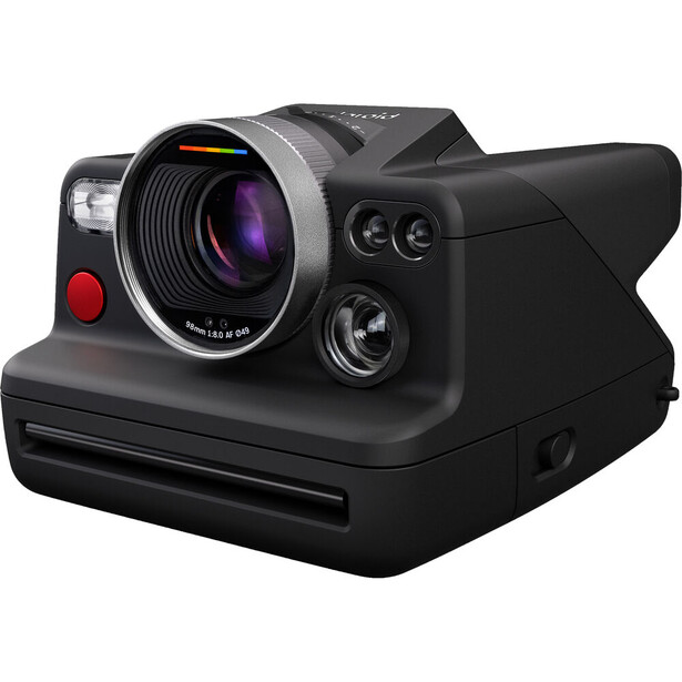 Polaroid Originals Now+ instant camera with black body, purple-tinted lens, and red shutter button.