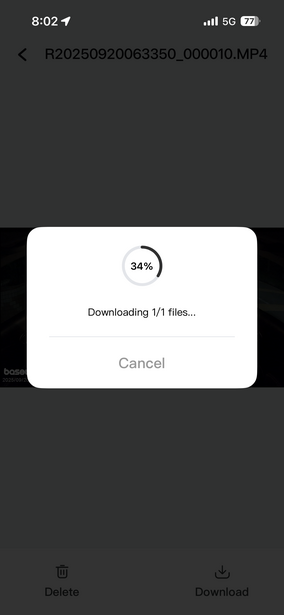 Screenshot of a mobile download dialog showing 34% progress while downloading 11 files.