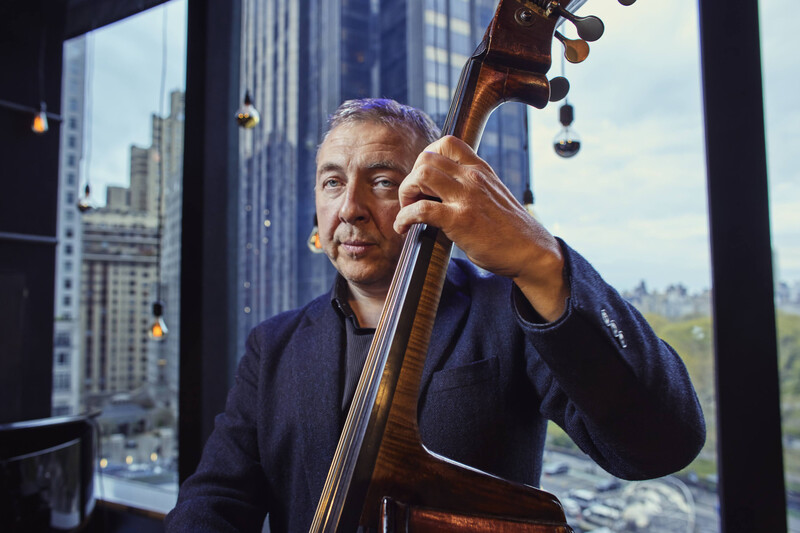 A jazz bassist at the gig.