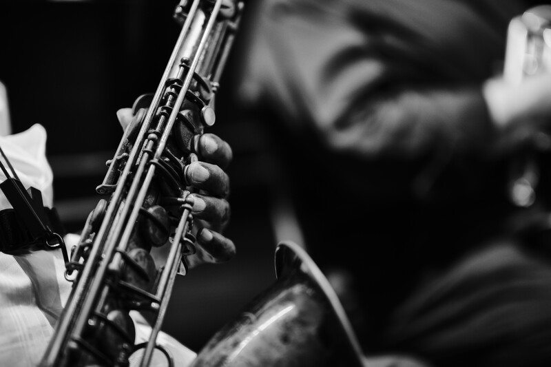 &nbsp;A close up of a saxophonist's hands.
