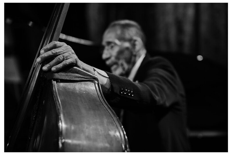 A closeup of a jazz bassist