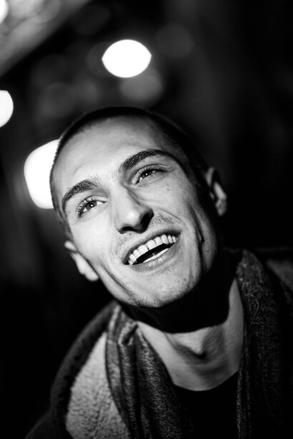 A portrait of a guitarist captured after a show.