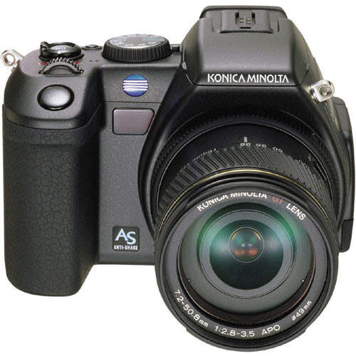 Konica Minolta A5 digital camera with attached zoom lens, shown against white background.
