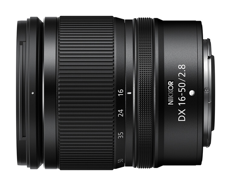 Nikon DX 18-55mm f/3.5-5.6G telephoto zoom lens with focus ring and focal length markings visible.
