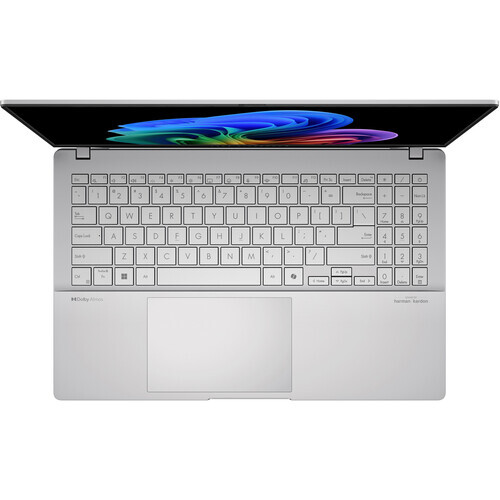 Top-down view of a silver laptop with open display showing colorful blue and purple gradient wallpaper.