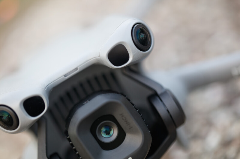 Top-down view of a drone's camera array showing multiple sensors and lenses mounted on the device.
