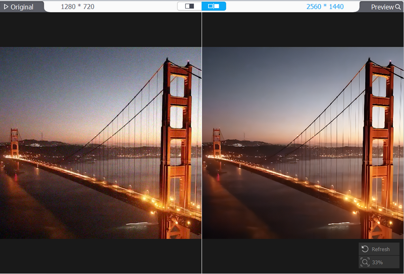 Golden Gate Bridge at dusk with warm lights reflecting on water below.