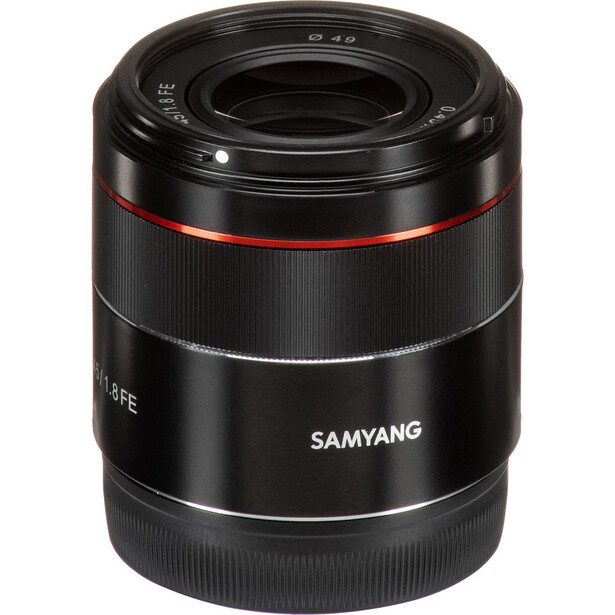 Samyang autofocus telephoto lens with black barrel and red accent ring against white background.