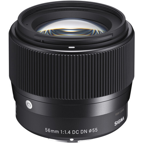 Sigma 56mm f/1.4 DC DN Contemporary lens with black ribbed focusing ring and glass elements visible through front optics.