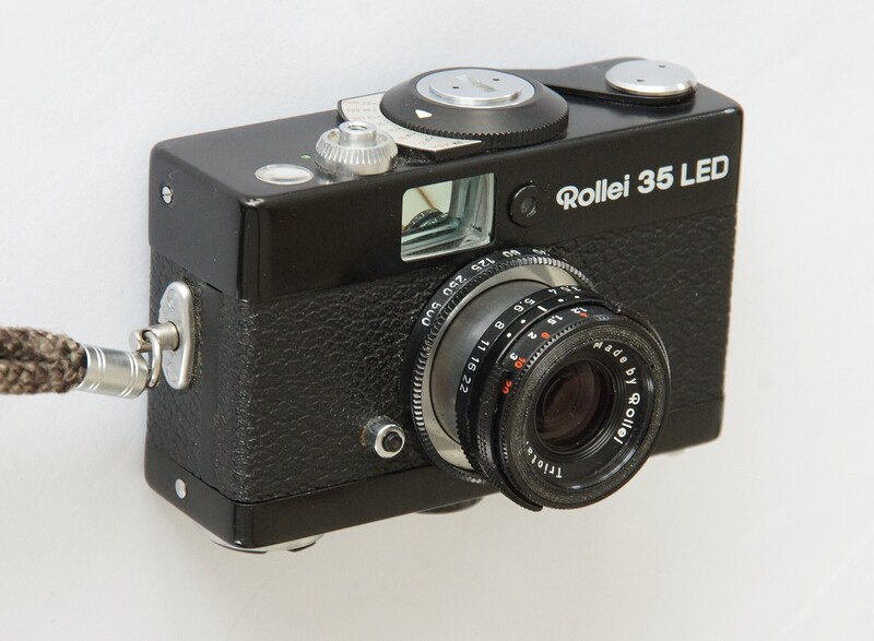 Rollei 35 LED compact film camera with black textured body and rangefinder viewfinder.