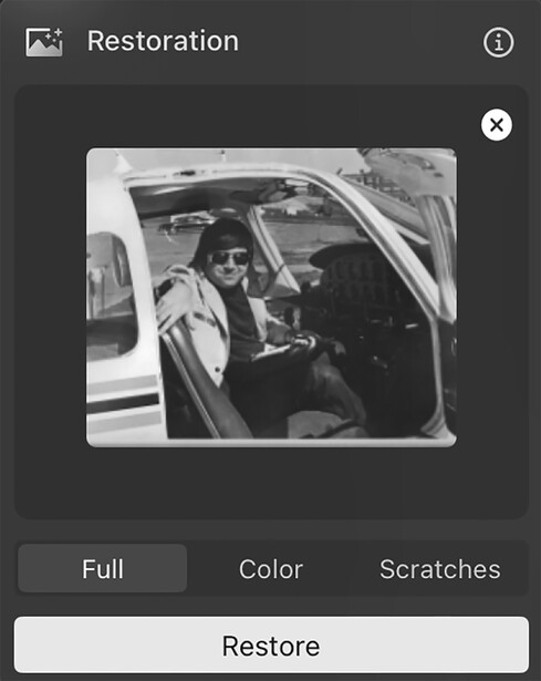 Screenshot of a photo restoration interface displaying a black and white vintage photograph of a man in a car.