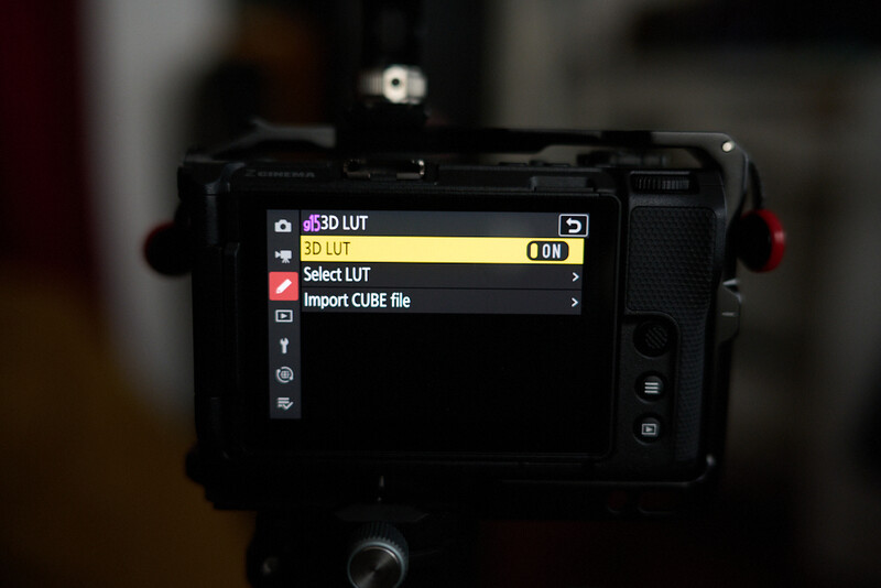 Camera LCD screen displaying LUT menu options with 3D LUT and Select LUT highlighted in yellow.
