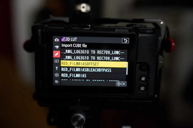 Screenshot of a RED camera's LUT import menu displaying color correction options and file selections.