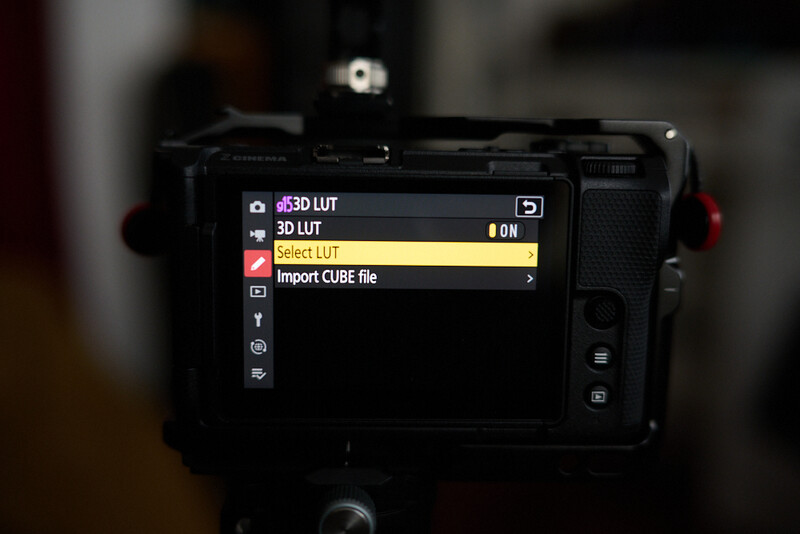 Screenshot of camera LCD menu showing LUT import options with 3D LUT, 2D LUT, and Import CUBE file selections.