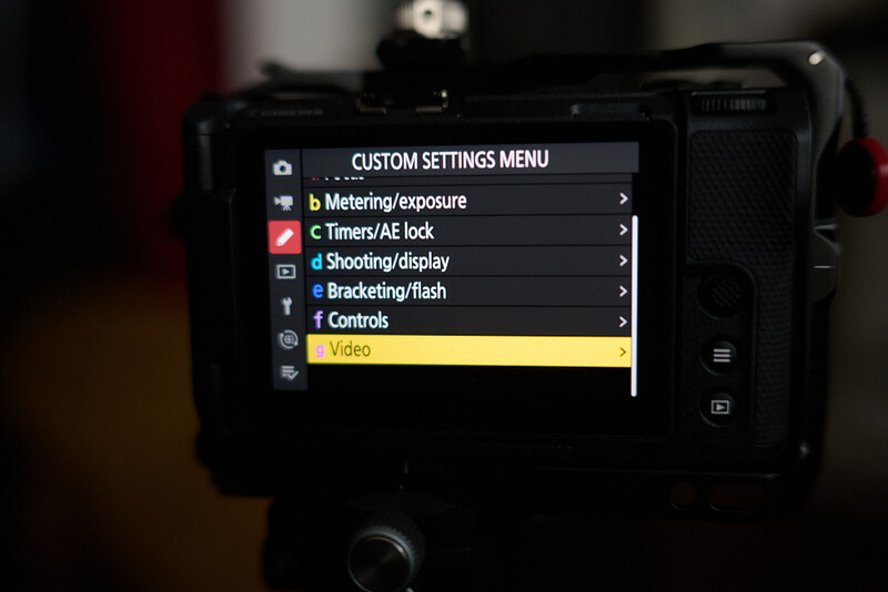 Screenshot of camera custom settings menu displaying Video option highlighted in yellow among other shooting options.