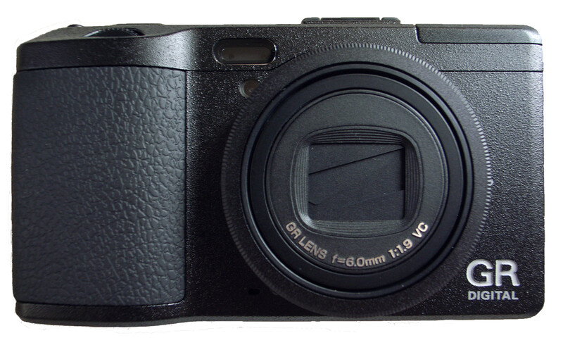 Ricoh GR Digital compact camera with fixed 28mm lens, shown from front against white background.