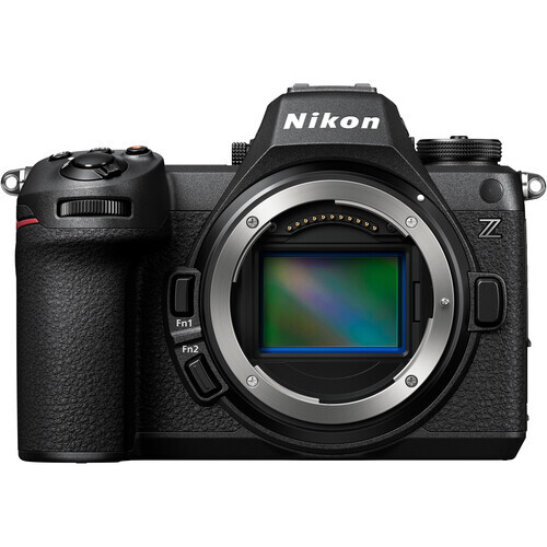 Nikon Z mirrorless camera body shown from front with lens mount exposed and viewfinder visible.
