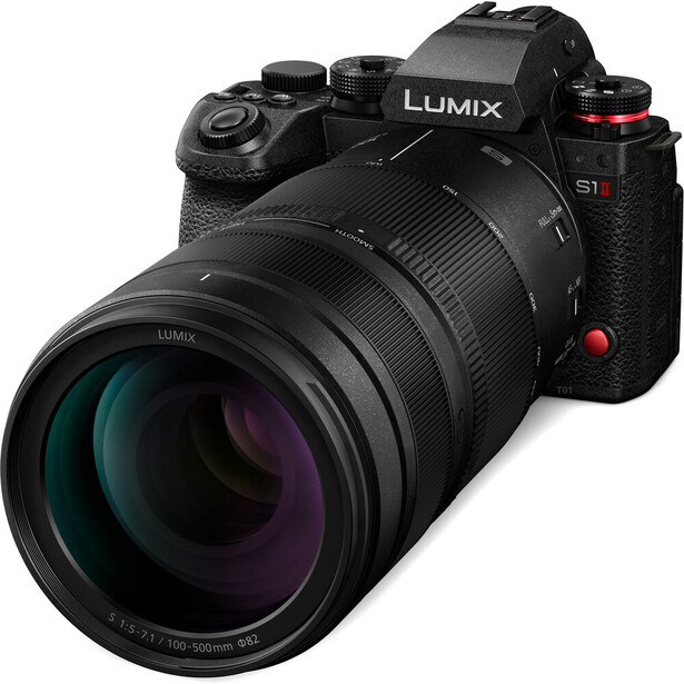 Panasonic Lumix S1H mirrorless camera with attached telephoto zoom lens against white background.