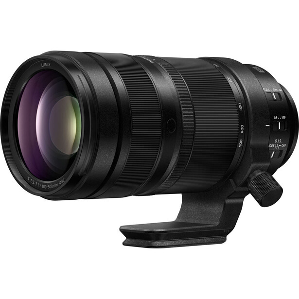 Black telephoto zoom lens with purple-tinted front element and focus ring against white background.