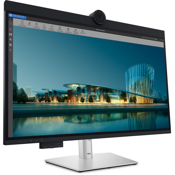 Professional monitor displaying a modern waterfront building with blue evening lighting and its reflection in water.
