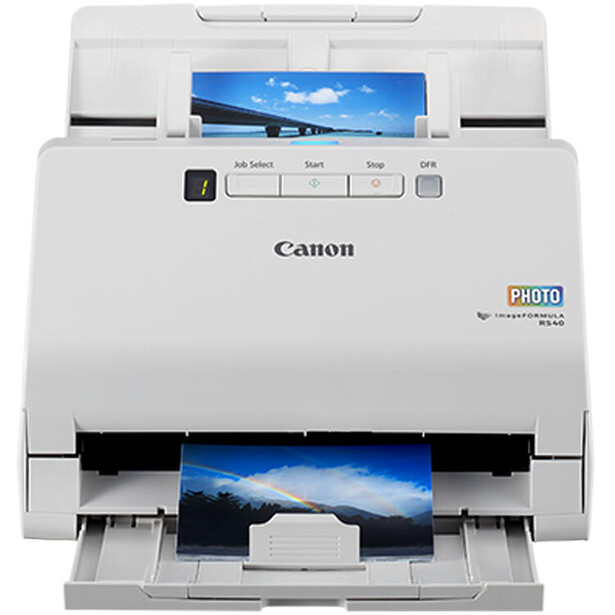 Canon imageFORMULA document scanner with photo output displayed on top and bottom trays.