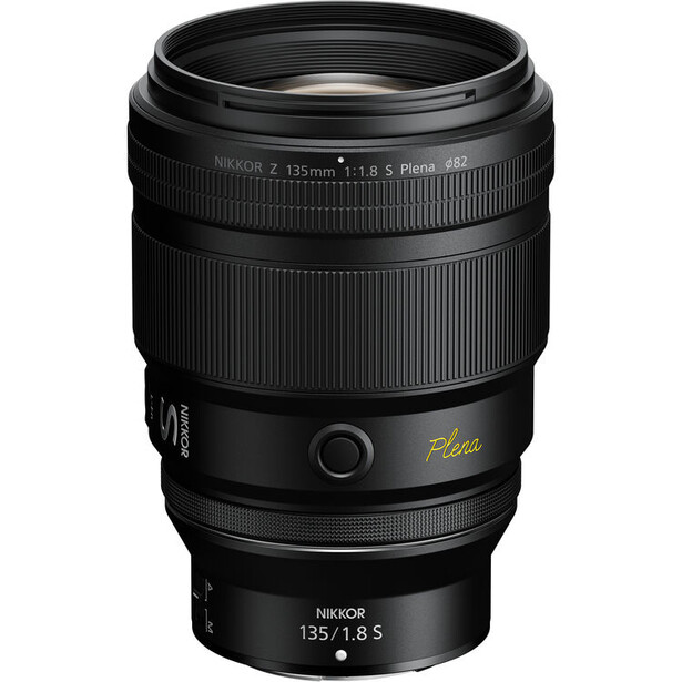 Nikon Z 135mm f/1.8 S telephoto lens with gold accent ring and focus motor detail.