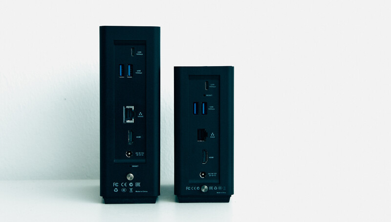Two black rectangular electronic devices of different sizes displayed side by side against a white background.