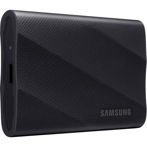 Samsung portable solid-state drive with textured black finish and rounded edges.