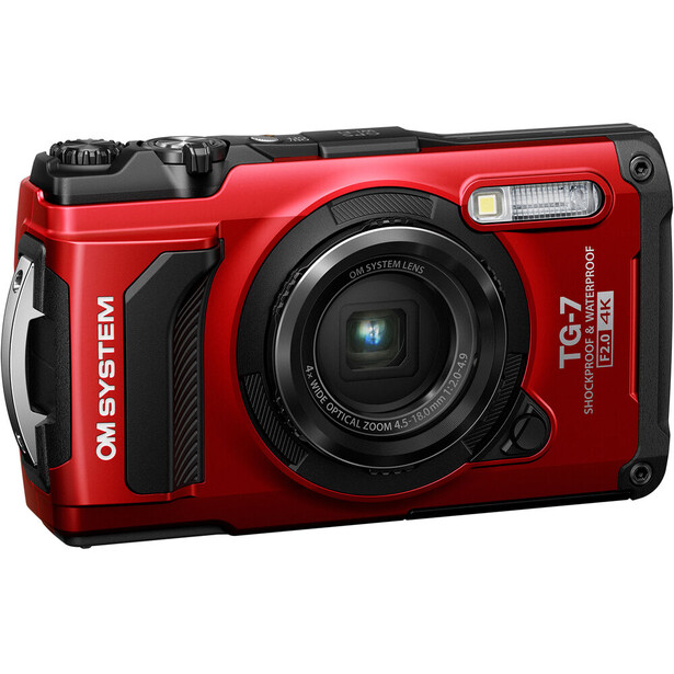 Olympus TG-7 compact rugged camera in red with black accents, shown from front-left angle.