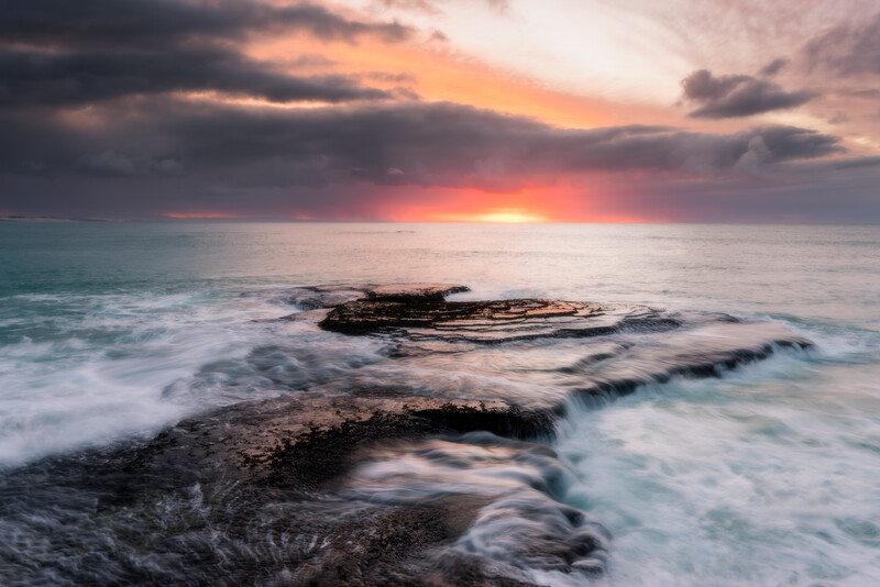 A sunrise at Arniston near Cape Town. Shot using a wide-angle lens.